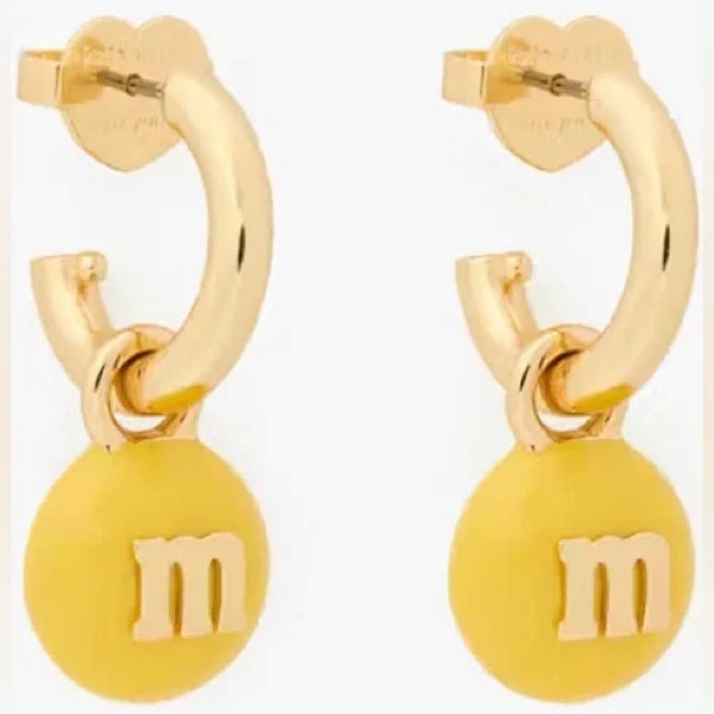 Authentic New on card. Kate spade yellow M&M earrings.